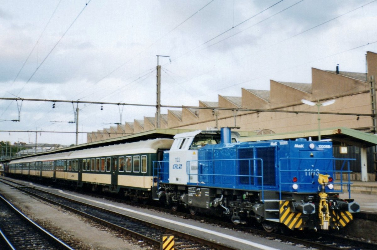 Old and new: CFL 1103 (rather new) shunts with Wegmann coaches (older stock) at Luxembourg on 19 May 2004.