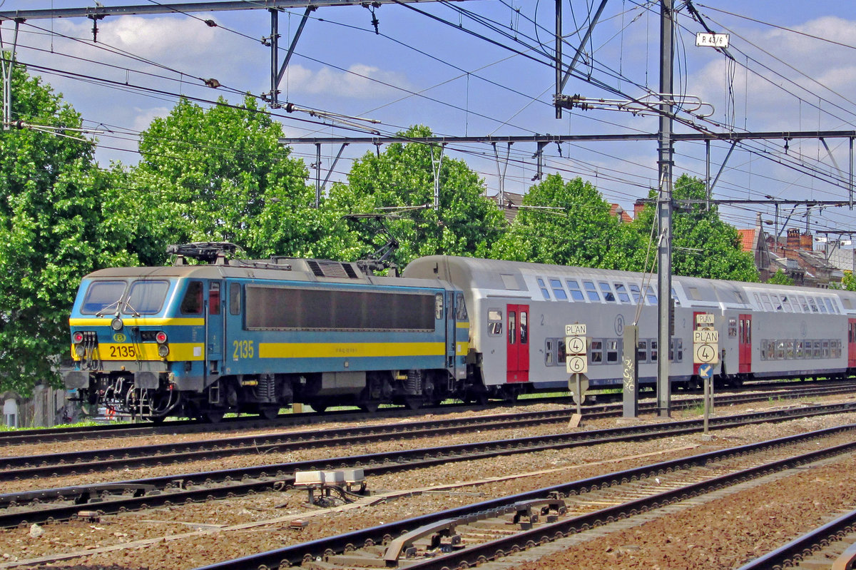 On 10 June 2015 NMBS 2135 pushes M5-stock out of Antwerpen-Berchem toward Antwerpen Centraal and Essen (BE).