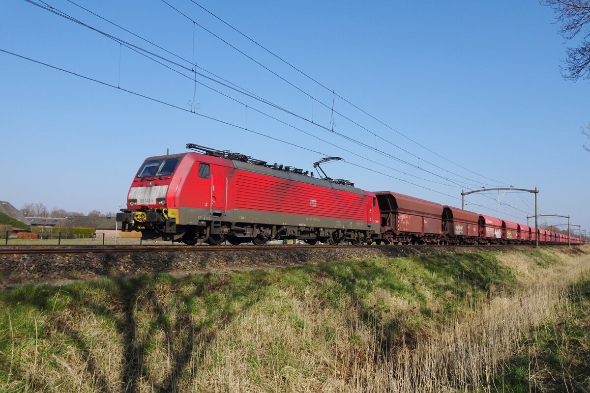 On 10 March 2022 DBC 189 042 hauls an ore train through Oisterwijk.