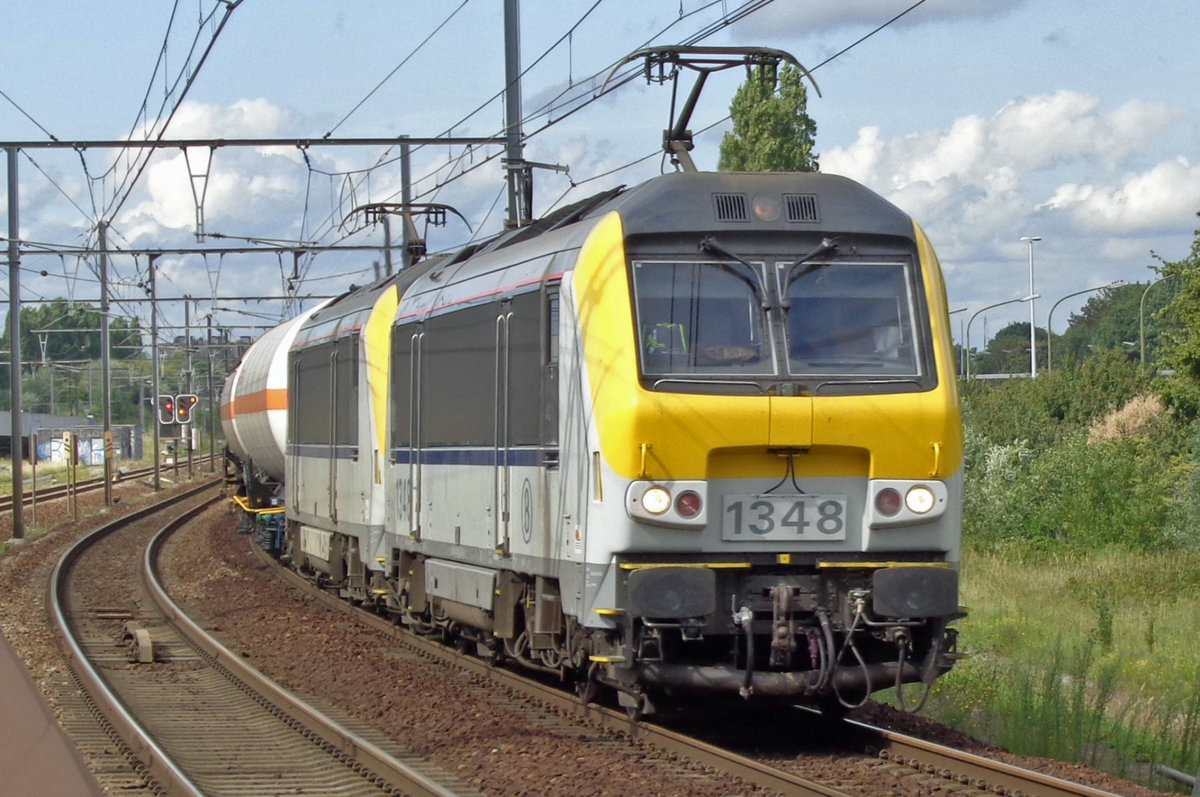 On 12 August 2017 NMBS 1348 hauls an LPG train through Antwerpen-Luchtbal.