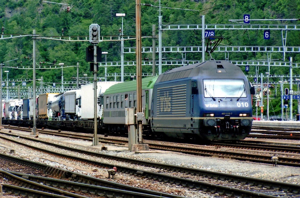 On 13 May 2010 BLS 465 010 hauls an intermodal toward Basel out of Brig station. This view is no longer possible due to sound barrier walls.