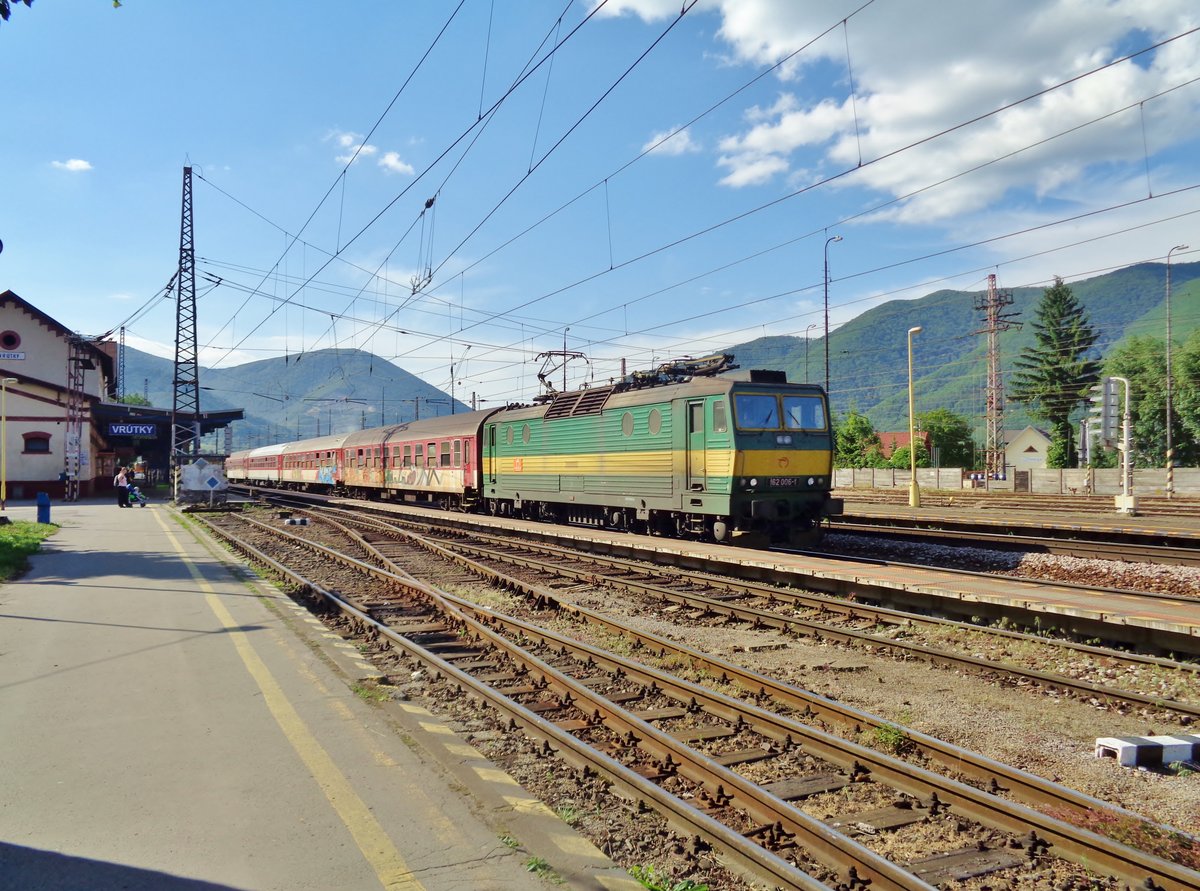On 14 May 2018 ZSSK 162 006 leaves Vrutky with a regional train for Poprad-Tatry.