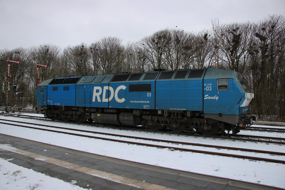 On 16 February 2026 RDC DE 2700-03 SANDY oozes at Nieb�ll in the far North of Germany. Even in rather off-season periods three car carrying trains can be spotted between Nieb�ll and Westerland (Sylt) -there are no roads between the two cities and all traffic has to take the train that crosses the sea arms over the Hindenburg causeway.