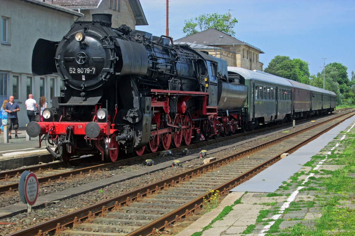 On 20 May 2018 Kriegslok 52 8079 stands with a steam shuttle to Marktschorgast ready for departure at Neuenmarkt-Wirsberg.