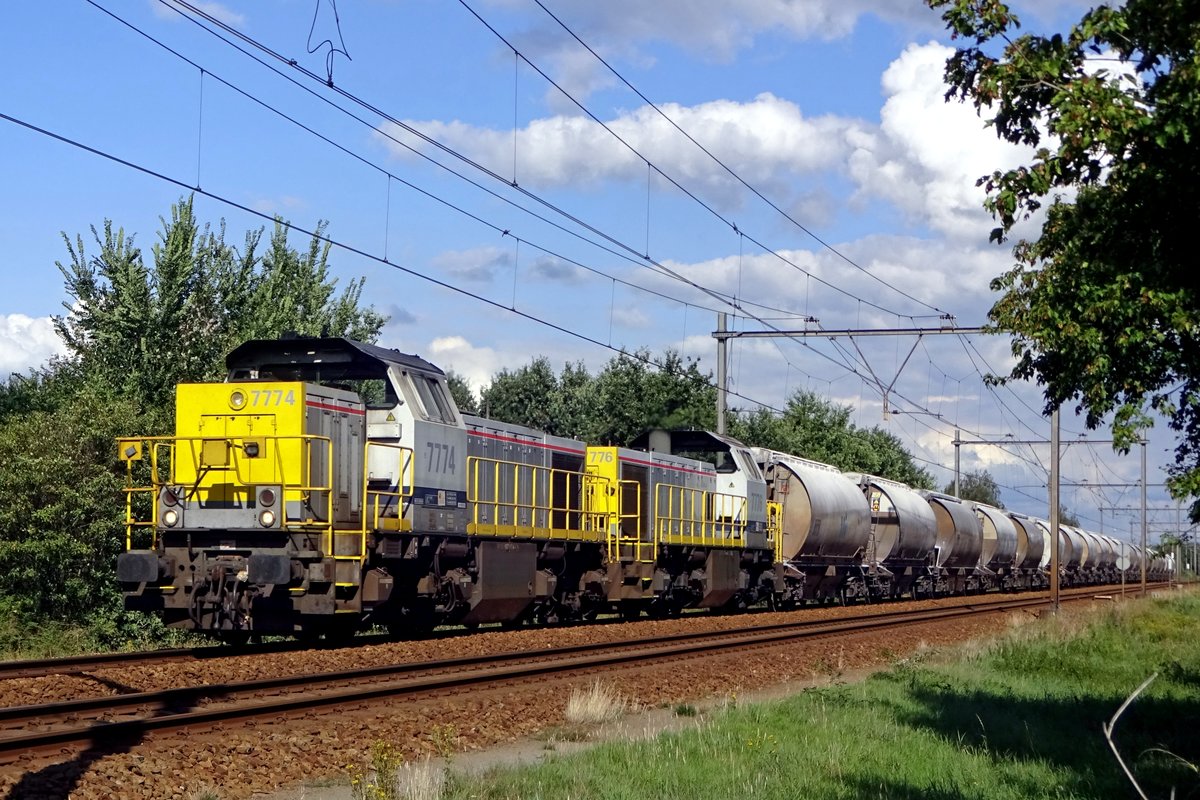 On 21 July 2019 NMBS 7774 hauls a diverted dolime train through Wijchen.