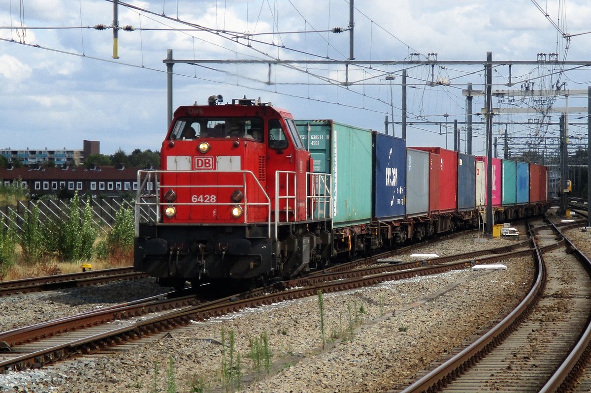 On 24 July 2018 a container train headed by 6428 is about to pass Breda.