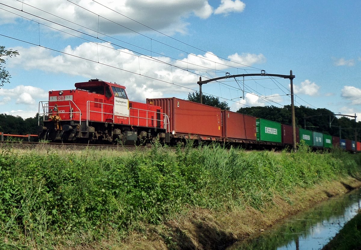 On 26 July 2018 a container train headed by 6430 passes through Tilburg Oude Warande.