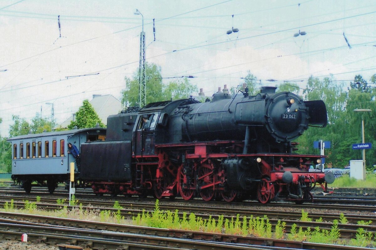 ON 27 May 2008 one Prussian coach gets hauled by 23 042 at Darmstadt-Kranichstein.