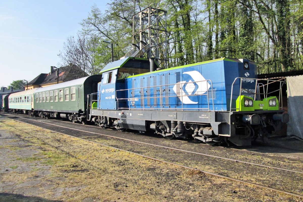ON 29 April 2016 SM 42 1230 stands at Wolsztyn with an extra train.