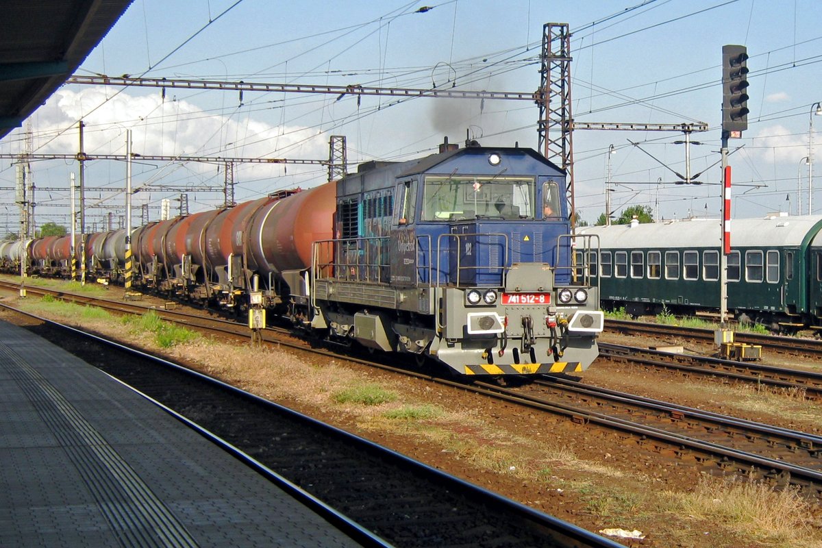On 30 May 2012 UniPetrol Doprava 741 512 hauls a tank train out of Pardubice toward Praha-Liben.