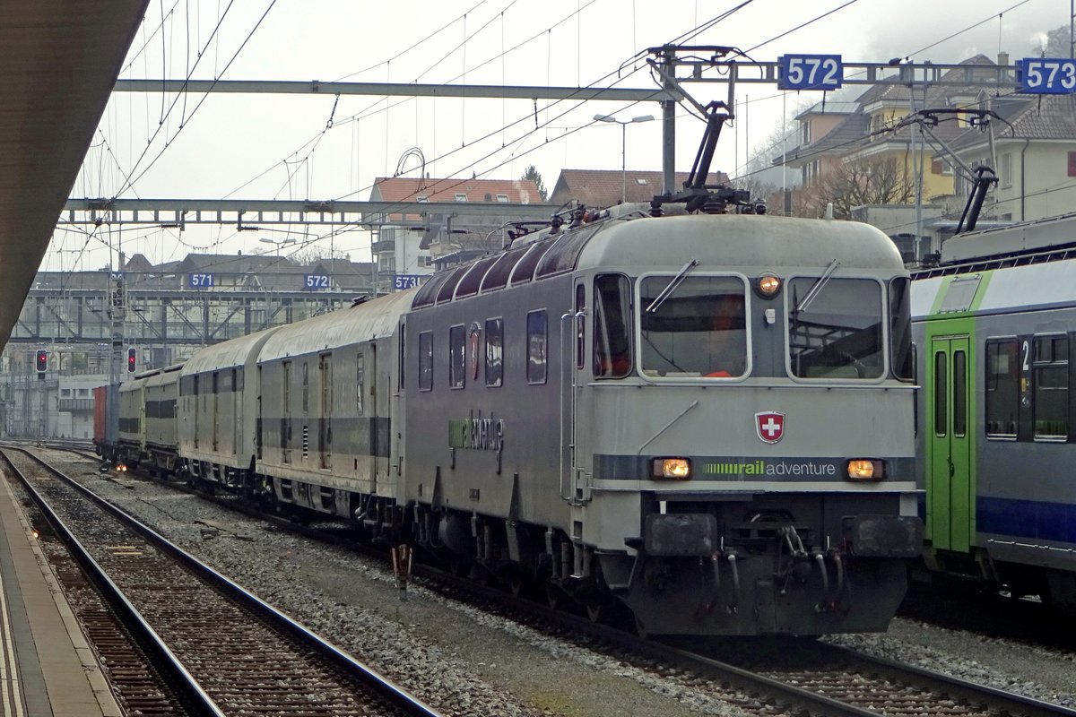 On 31 December 2019 Rail Adventure 11603 stands at Spiez and gets photographed, despite the less-than-ideal lighting conditions.