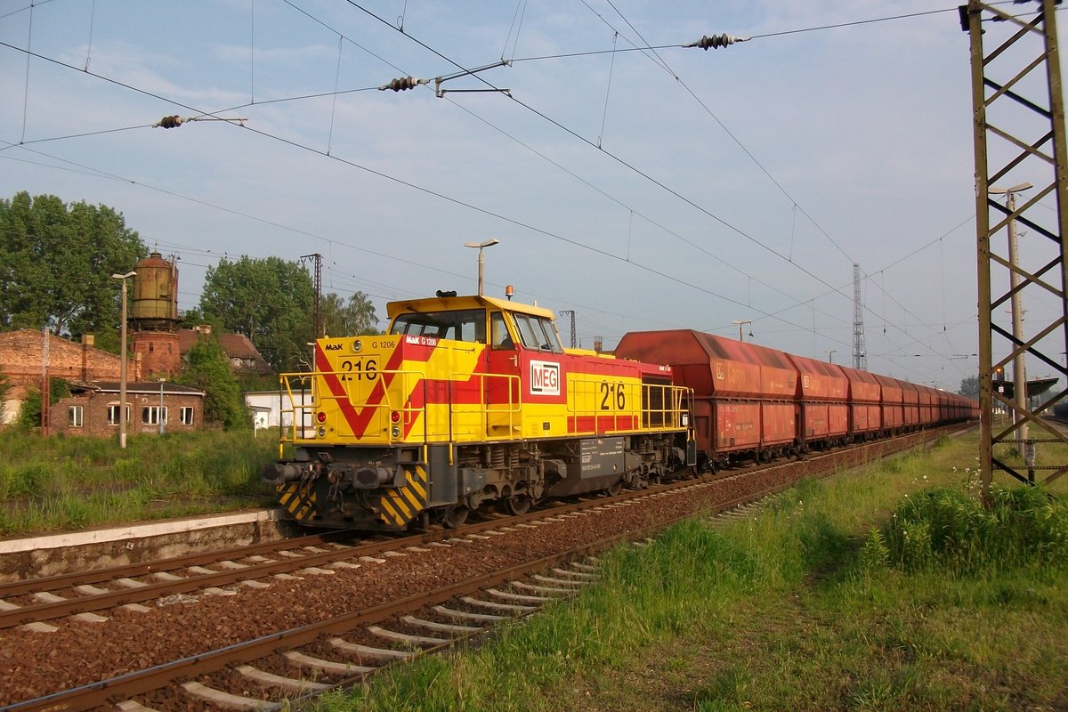On 31 May 2010 MEG 216 hauls a coal train through Grosskorbetha.