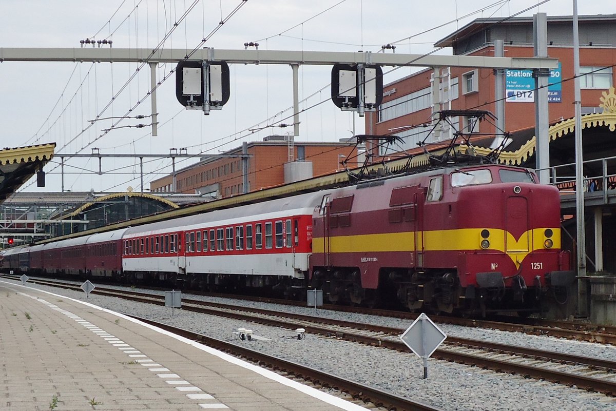 On 4 July 2014, EETC 1251 stands with an overnight train into 's-Hertogenbosch after having run round in preparation for the leap to Venlo, where an AC loco will take over this train.