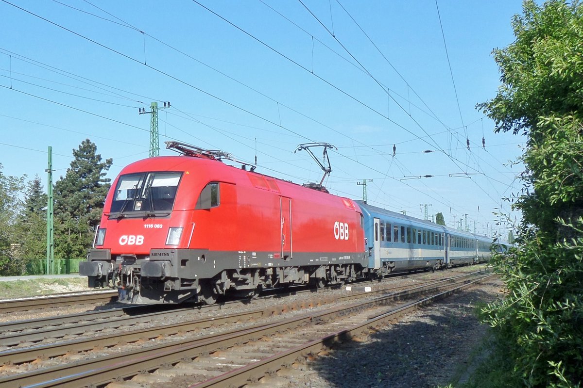 On 7 May 2016 ÖBB 1116 063 hauls an EC service to Budapest out of Hegyeshalom.