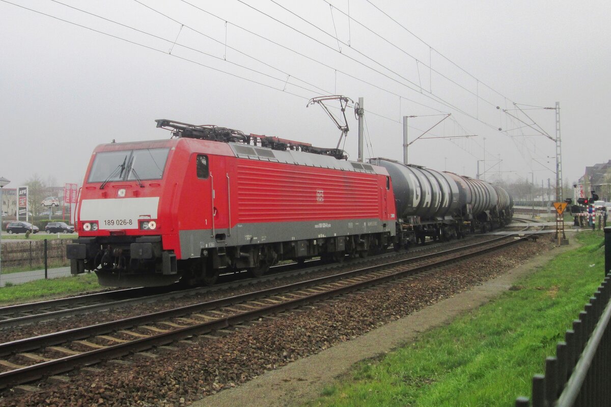 On a damp 23 March 2019 DB 189 026 hauls a GATX tank train out of Venlo -and out of the Netherlands while passing Vierpaardjes -with the Dutch-German border less than a mile away.
