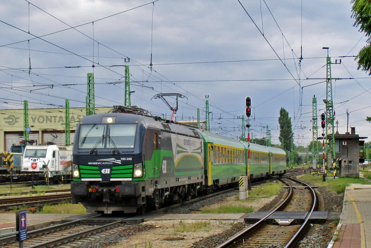 On a grey 6 May 2017, GySEV 193 246 hauls a short IC into Györ.