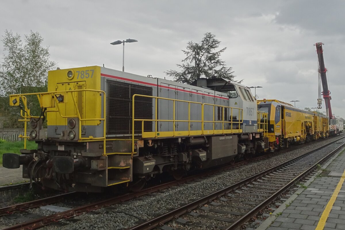 On a grey 6 May 2023 InfraBel 7857 stands at parked at Eeklo in preparations of track work between Gent and Eeklo. 