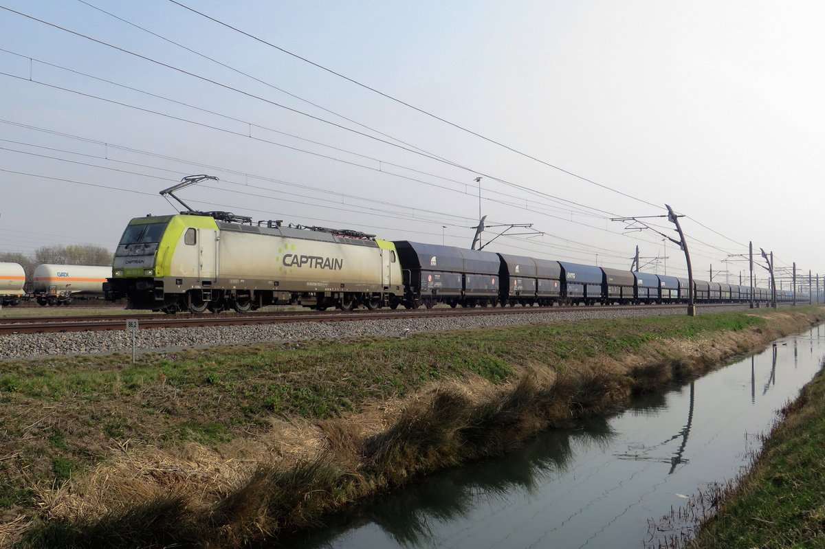 ON a misty morning of 3 March 2021 Captrain 186 152 hauls a coal train past Valburg CUP.