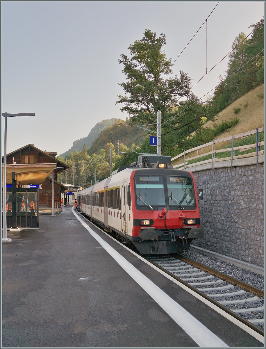 On the first day of operation after the work on changing the gauge of the Bulle - Broc line from meters to standard gauge, a TPF Domino in Broc fabrique is waiting to leave. This is the service to Düdingen.

August 24, 2023