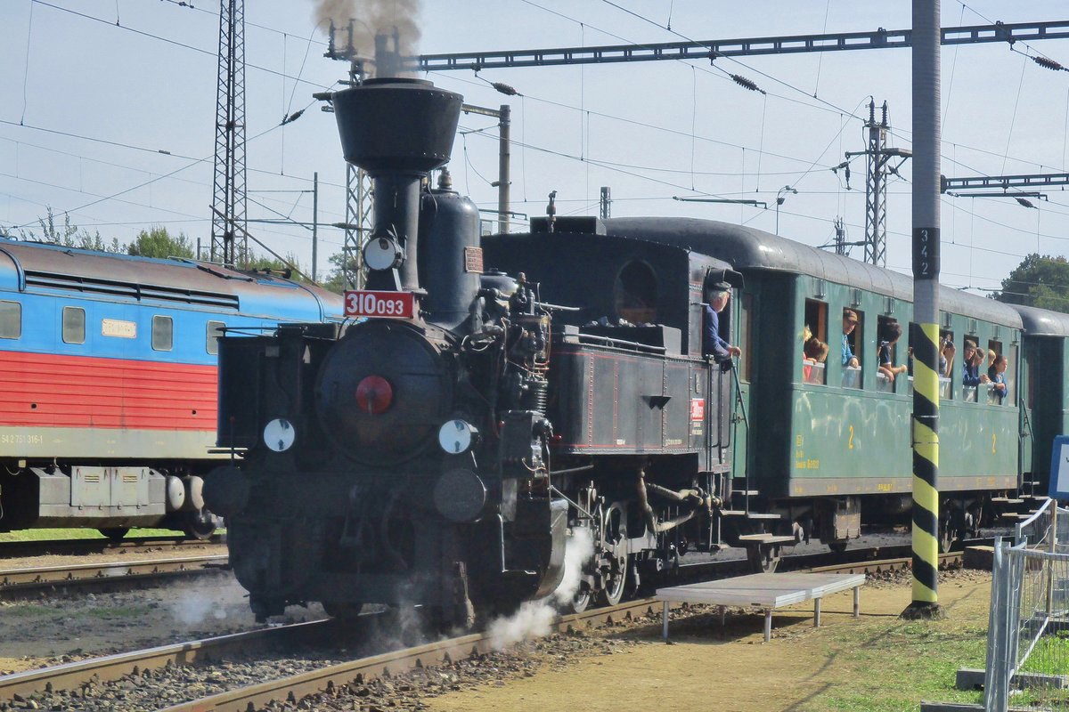 On the terrain of the CD-works at Ceske Budejovice, 310 093 hauls a steam train during the Open Day on 23 September 2018.