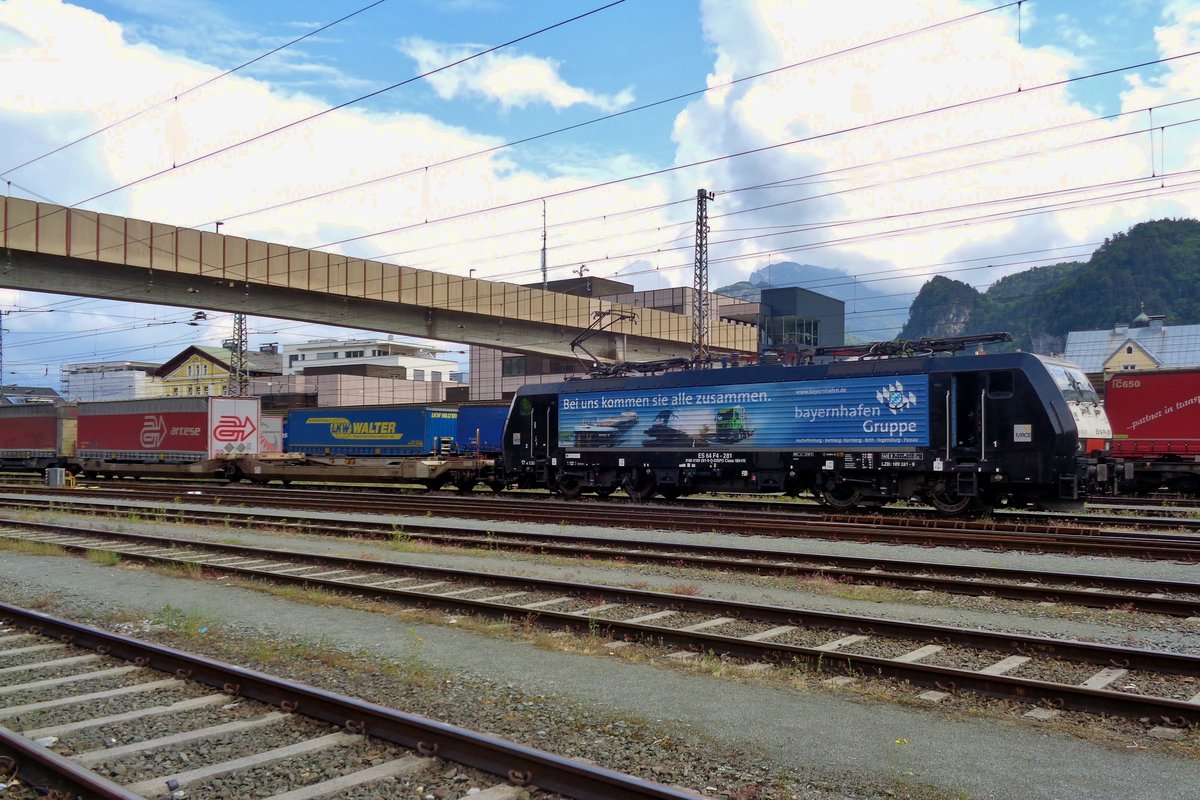 One of seven TX Logistics trains arriving at Kufstein for changes in crew and addition of banking locos on Friday 18 May 2018 was hauled by 189 281 still carrying advertisement stickers for Bayernhafen Gruppe.