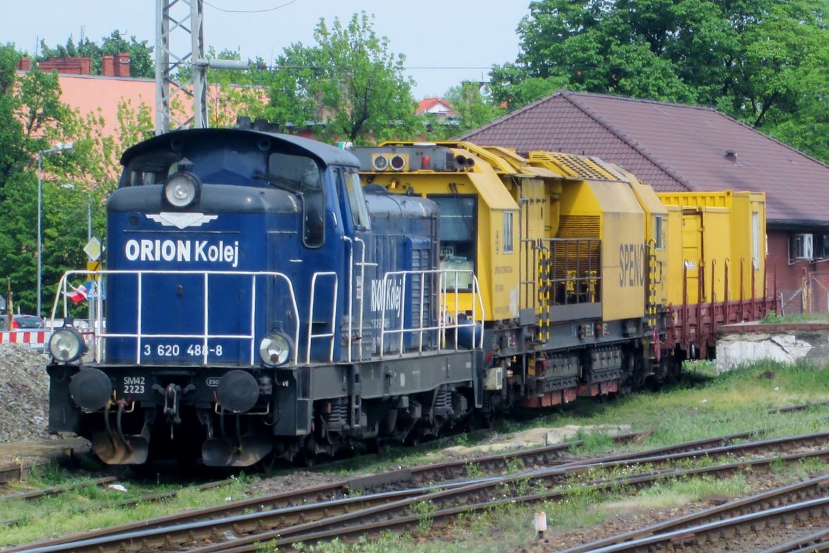 Orion Kolej SM42-2223 stands with a SPENO working train in Jaworzyna Slaska on 30 April 2018.
