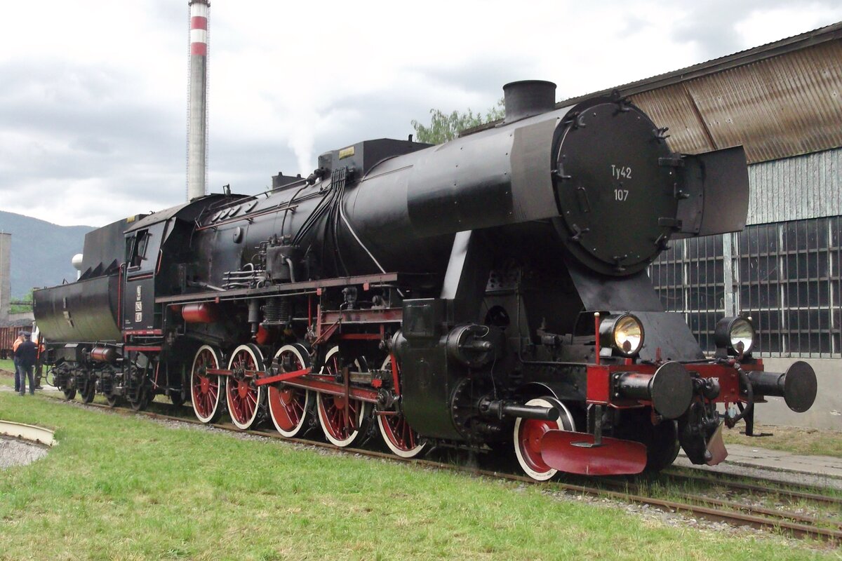 Polish ex-DRG Kriegslok Ty42-107 stands as a guest in Vrutky Nakladi Stanica on 30 May 2015.