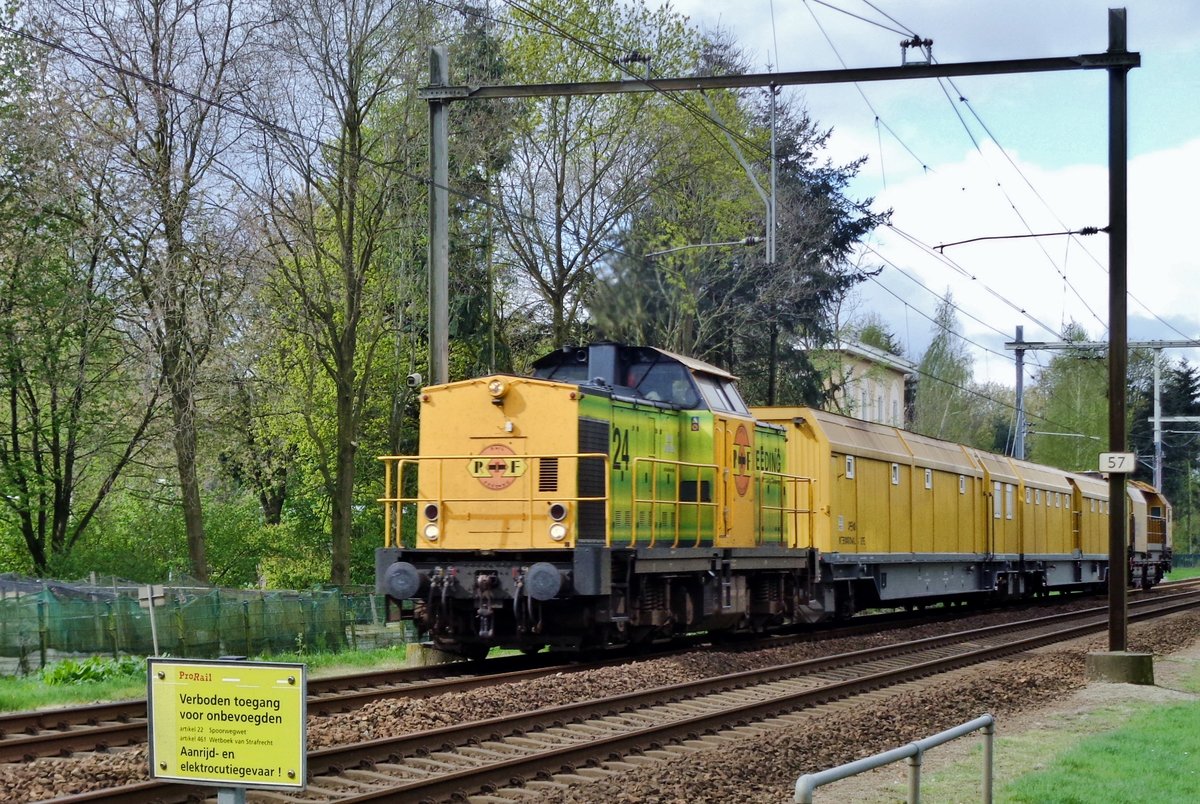 Railway engineering train is headed by RRF24 while passing through Wijchen on 24 April 2017.