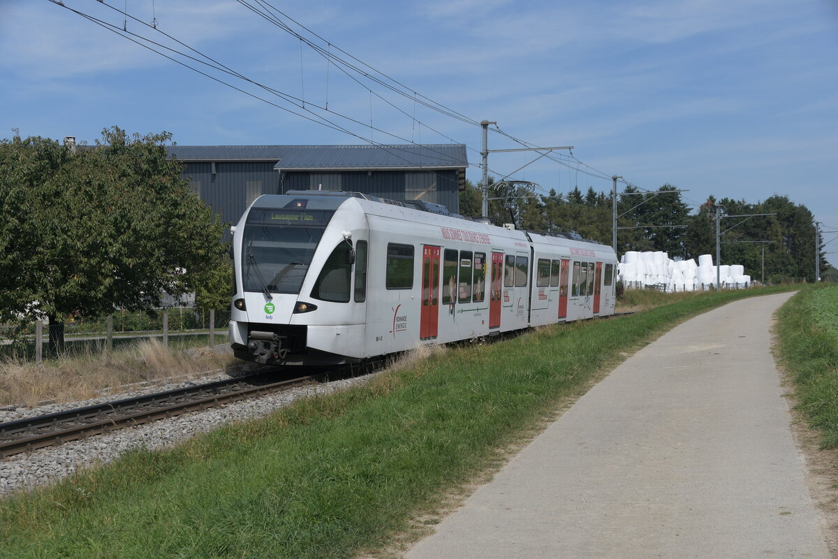 RBe 4/8 42 revêtu la publicité pour la Romande Energie
Ici à Echallens Grésaley
Prise le 11 septembre 2020

RBe 4/8 42 coated with advertising for Romande Energie
Here at Echallens Grésaley
Taken on September 11, 2020 