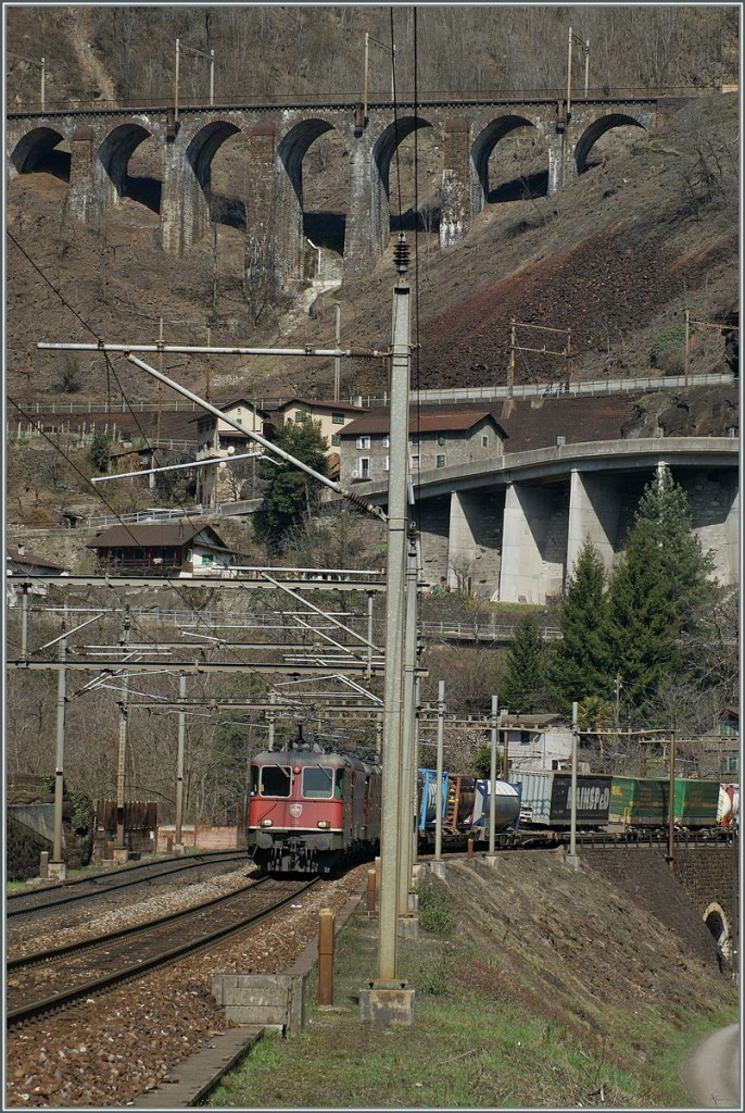 Re 4/4 II an other locomotives with a Cargo Train in the Biaschina. 
03.04.2013