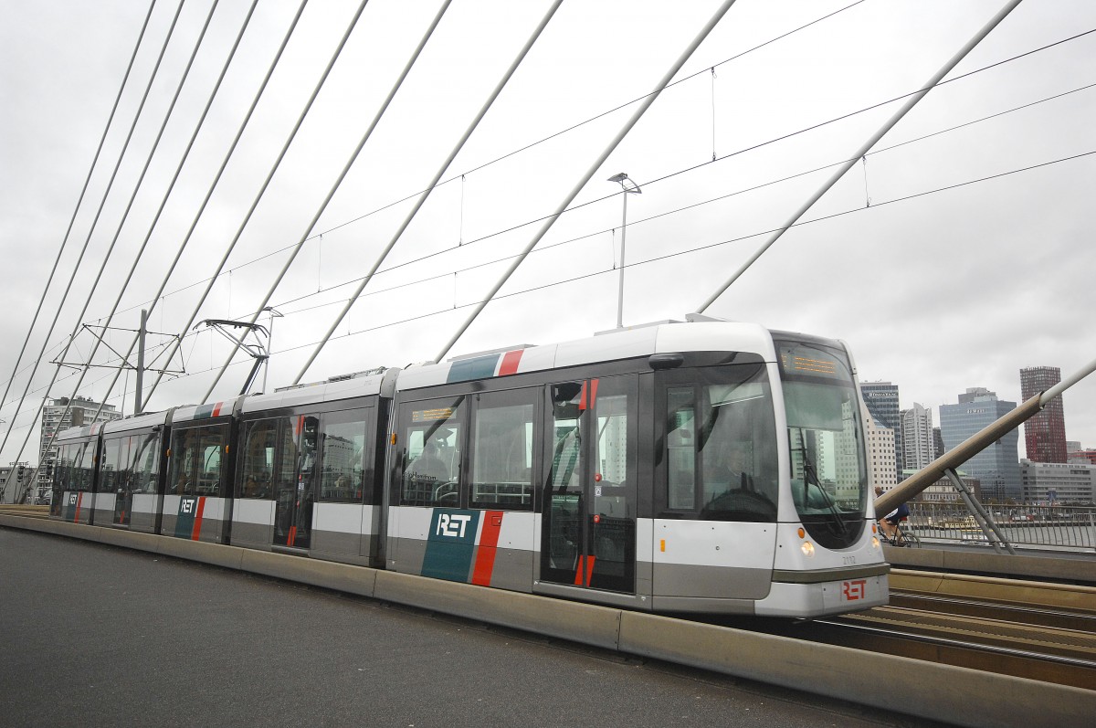 RET 2112 on Line 20 from Rotterdam Centraal to Kreekhuizenlann on the Erasmusbridge. The Tram is a model Citadis. Date: 7. October 2011. The bridge is not equal - that's why the tram is going a bit uphill on the photo.