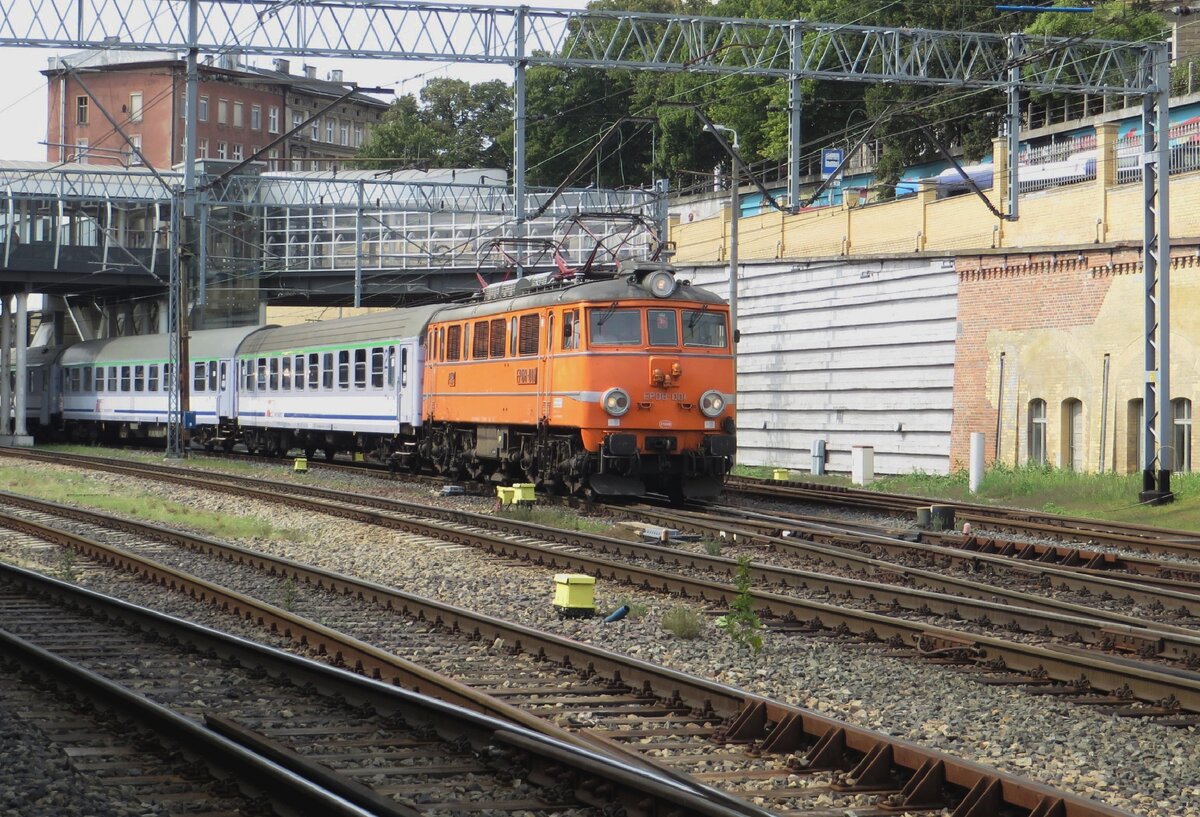 Retro liveried EP08-001 hauls an IC to Wroclaw out of Szczecin Glowny on 22 August 2021.