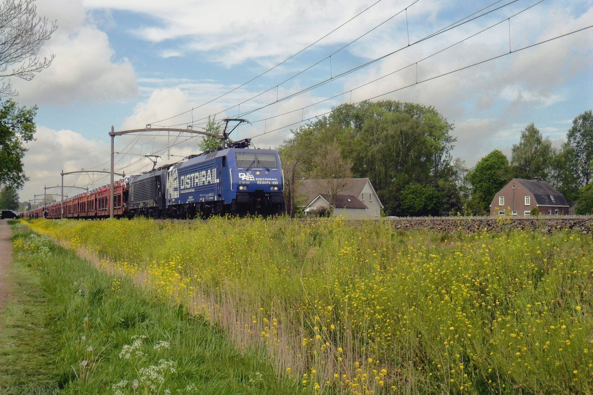 RF/DistriRail 189 099 hauls the Safenwill automotive train through Oisterwijk on a damp 26 April 2019.