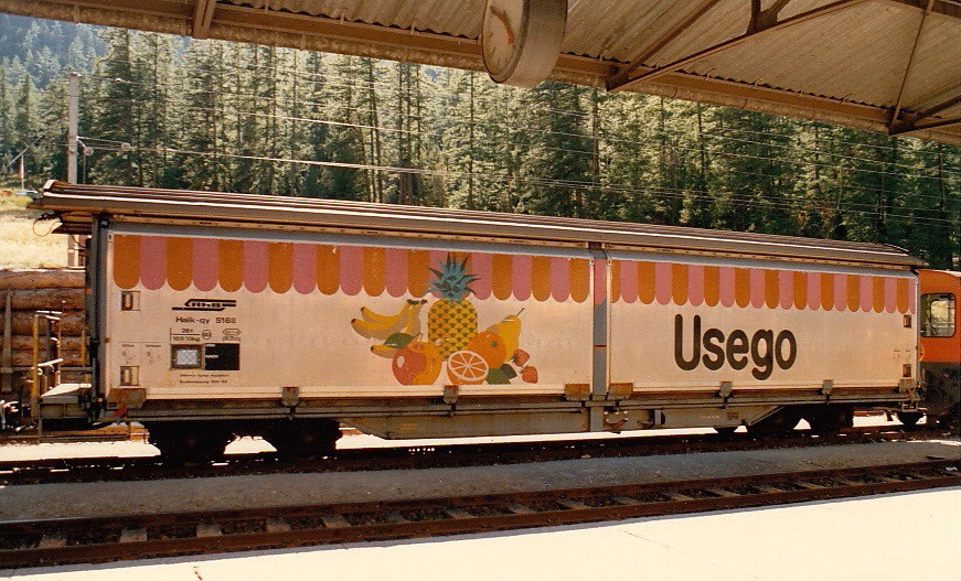 Rhaetian Railway - Usego Insulated/Heated Sliding Wall Covered Wagon Haik-qy 5168 in station Pontresina, August 1987