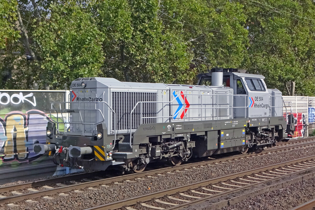 RheinCargo DE 504 runs light through Köln Süd on 23 September 2019.