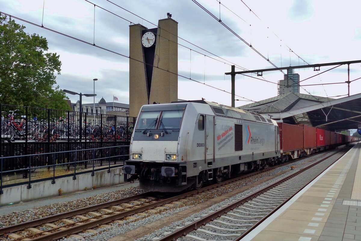 RheinCargo DE 803 hauls a container train through Tilburg on 29 July 2018.