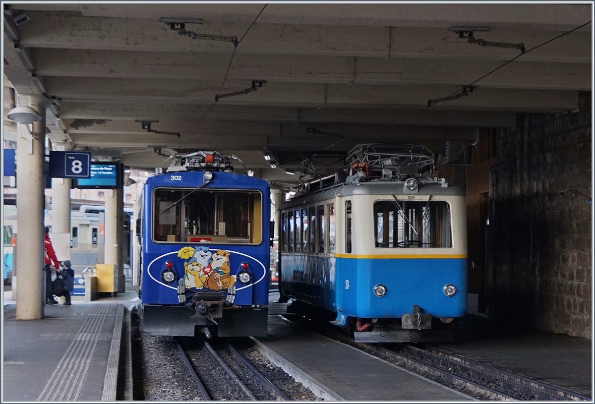 Rochers de Naye Bhe 4/8 302 an Bhe 2/4 in Montreux.
27.11.2016