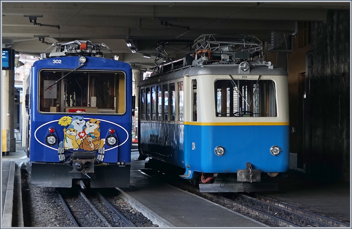 Rochers de Naye Bhe 4/8 302 and Bhe 2/4 204 in Montreux.
27.11.2016