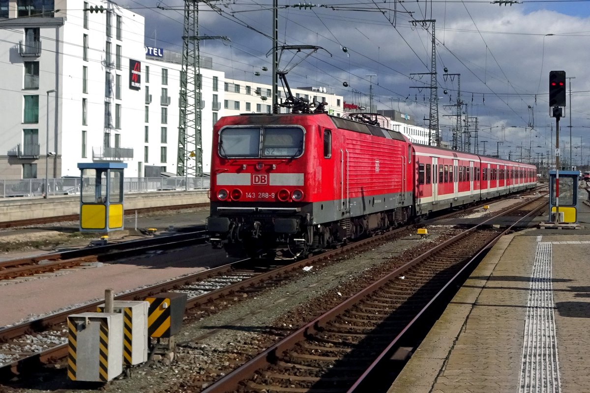 S-Bahn is pushed out of Nürnberg Hbf by 143 288 on 21 February 2020.