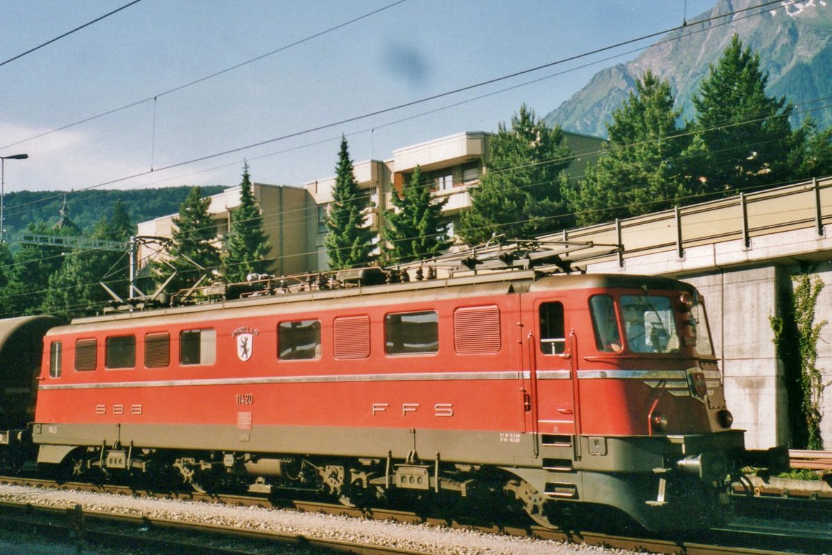 SBB 11420 stands in Spiez on 29 July 2000 while being photographed -the black dot above the loco is a flY. 