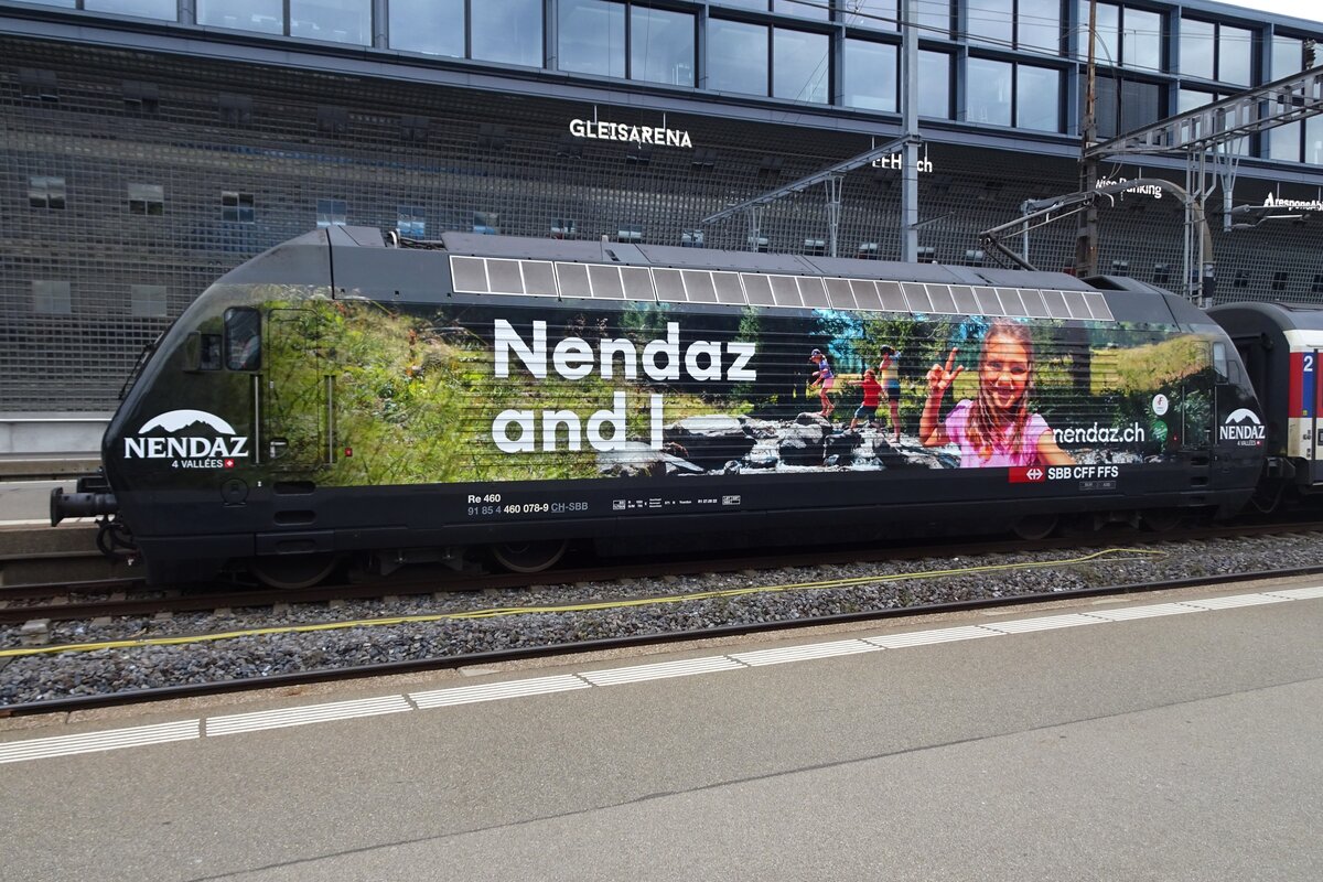 SBB 460 078 shows her latest advertising livery at Zürich HB on 19 May 2023.