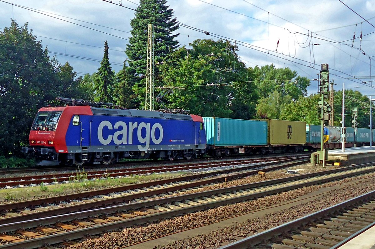 SBB 482 007 hauls a container train through Celle on 8 September 2015.