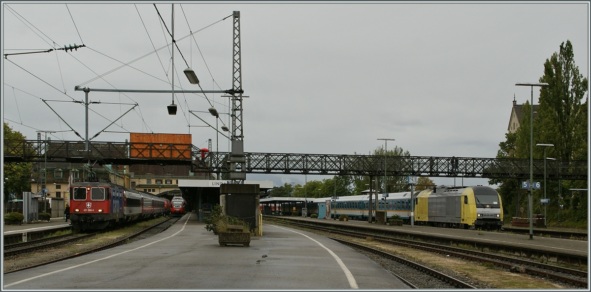SBB Re 421 with an EC, a ÖBB ET 4024 and a Alex Service to München in Lindau.
18.09.2011