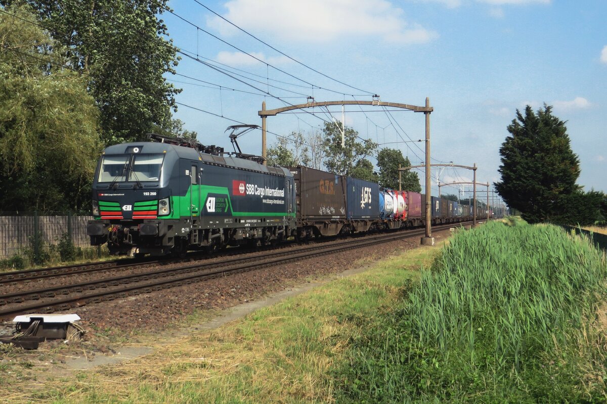 SBBCI 193 260 hauls a container train through Hulten on 9 July 2021.