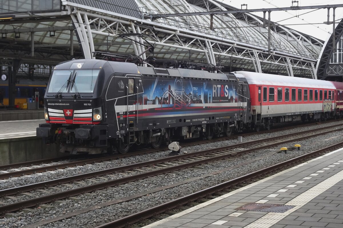 SBCI 193 701 enters Amsterdam Centraal with the TUI Ski-Express on 22 January 2023.