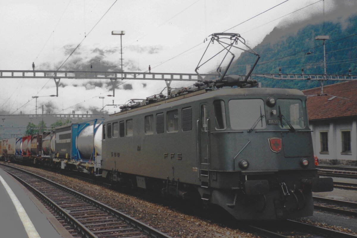 Scanned photo of 11491 banking one of the numerous freights at Erstfeld on 18 June 2001 -a sight belonging to the past with the Gotthard Base Tunnel opened in 2016.