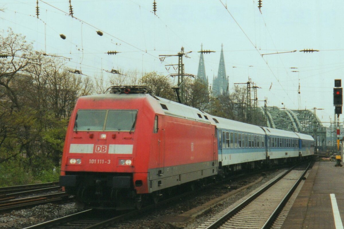 Scanned photo of DB 101 111 hauling an Interregio through Köln Deutz toward Duisburg and Kassel on 18 March 2002.