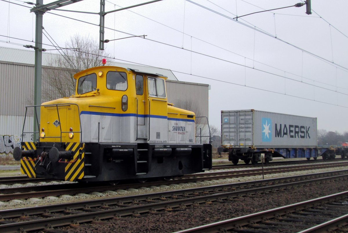 Shunter Tractie 503 runs light at Blerick on 11 February 2015.