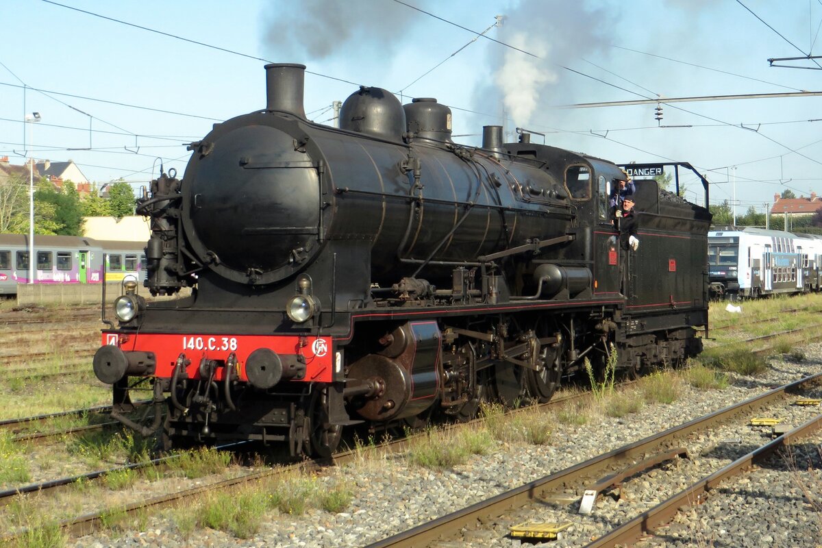 SNCF 140 C-38 runs light through Nevers on 18 September 2021.