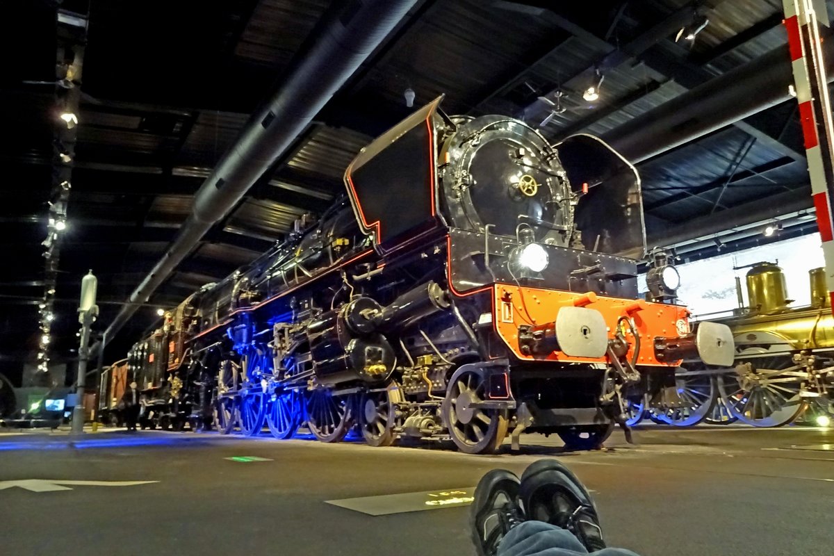 SNCF 241 A-1 stands in the Cité du Train Mulhouse and was photographed on 30 May 2019 by a rather lazy photographer, the feet of whom can be seen in the foreground.